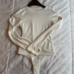 Pumiey White Long Sleeve Bodysuit
